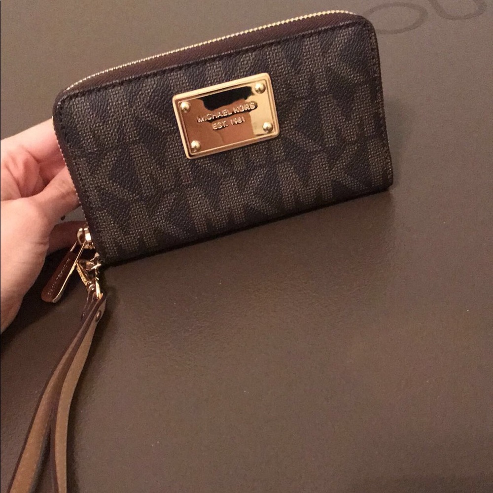 BRAND NEW MK wristlet with tags.